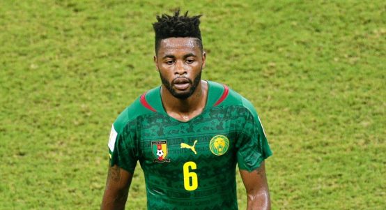 Cameroon's Alex Song leaves the pitch after being given a red card during the group A World Cup soccer match between Cameroon and Croatia at the Arena da Amazonia in Manaus, Brazil, Wednesday, June 18, 2014.