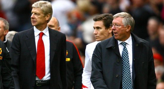 Arsene Wenger and Sir Alex Ferguson leave the field after the Premier League match between Manchester United and Arsenal at Old Trafford, Manchester, August 2009.