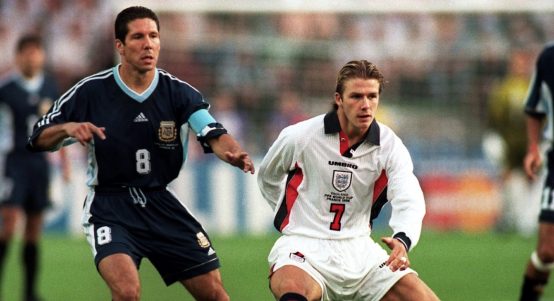 England's David Beckham (right) battles with Argentina's Diego Simeone (left) for the ball at the 1998 World Cup. Stade Geoffroy-Guichard, June 1998.