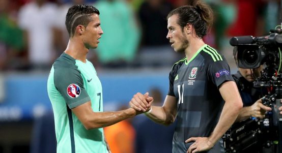 Portugal's Cristiano Ronaldo (left) and Wales' Gareth Bale (right) shake hands after the UEFA Euro 2016, semi-final match at the Stade de Lyon, Lyon.Portugal's Cristiano Ronaldo (left) and Wales' Gareth Bale (right) shake hands after the UEFA Euro 2016, semi-final match at the Stade de Lyon, Lyon.
