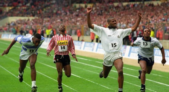 Swansea's John Williams wins a 100m race between footballers. Wembley Stadium, London. 1992.