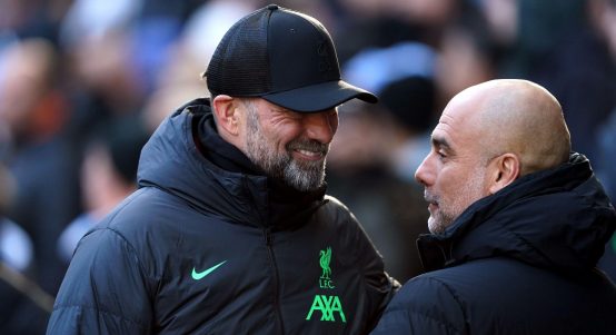 Manchester City manager Pep Guardiola (right) and Liverpool manager Jurgen Klopp ahead of the Premier League match at the Etihad Stadium, Manchester.