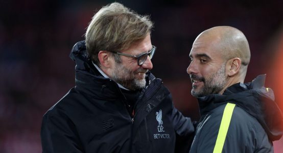 Jurgen Klopp, manager of Liverpool, and Manchester City Manager Pep Guardiola before the English Premier League match at Anfield Stadium, Liverpool. December 31st, 2016.