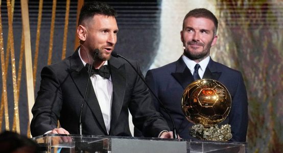 Inter Miami team co-owner and former soccer star David Beckham, right, smiles as Inter Miami's and Argentina's national team player Lionel Messi receives the 2023 Ballon d'Or trophy from during the 67th Ballon d'Or (Golden Ball) award ceremony at Theatre du Chatelet in Paris, France, Monday, Oct. 30, 2023.