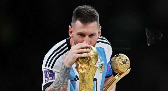 Lionel Messi of Argentina kissed the World Cup trophy