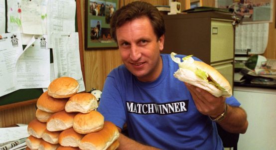 Notts County manager Neil Warnock enjoys some sandwiches. 1991.