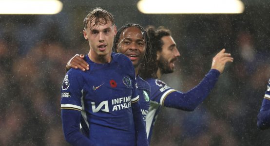 Chelsea's Cole Palmer, left, celebrates after scoring his side's fourth goal during the English Premier League soccer match between Chelsea and Manchester City at Stamford Bridge stadium in London, Sunday, Nov. 12, 2023
