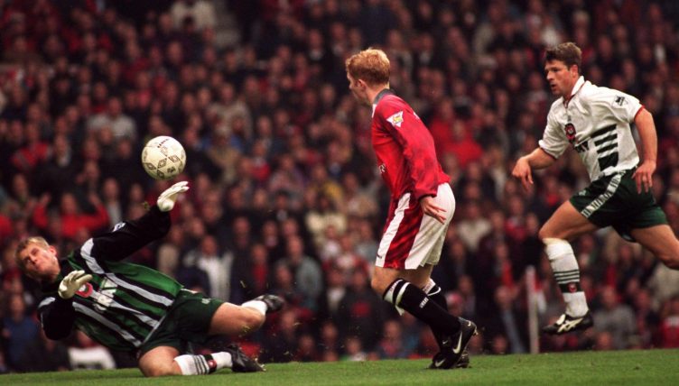 Manchester United's Paul Scholes scores Manchester United's sixth goal in the Premier League game against Barnsley at Old Trafford, Manchester. 25 October 1997.