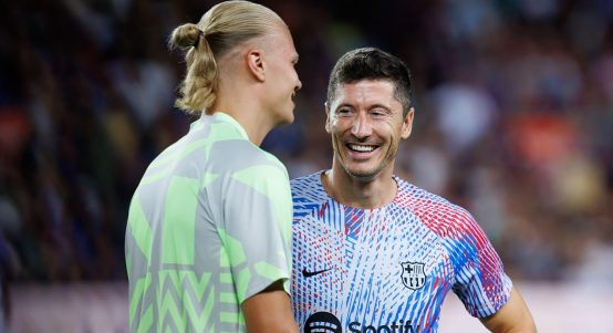 Barcelona, Spain. 24th Aug, 2022. Haaland (L) and Lewandowski (R) talk prior to the Friendly match between FC Barcelona and Manchester City at the Spotify Camp Nou Stadium in Barcelona, Spain.