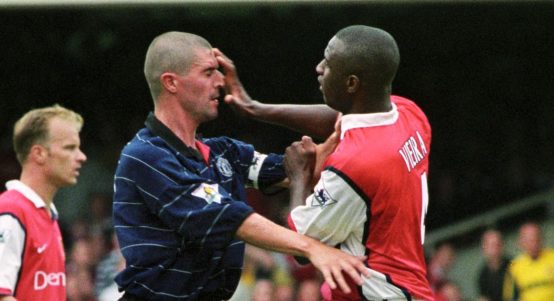 Manchester United's Roy Keane fights with Arsenal's Patrick Vieira. Highbury, London, August 1999.